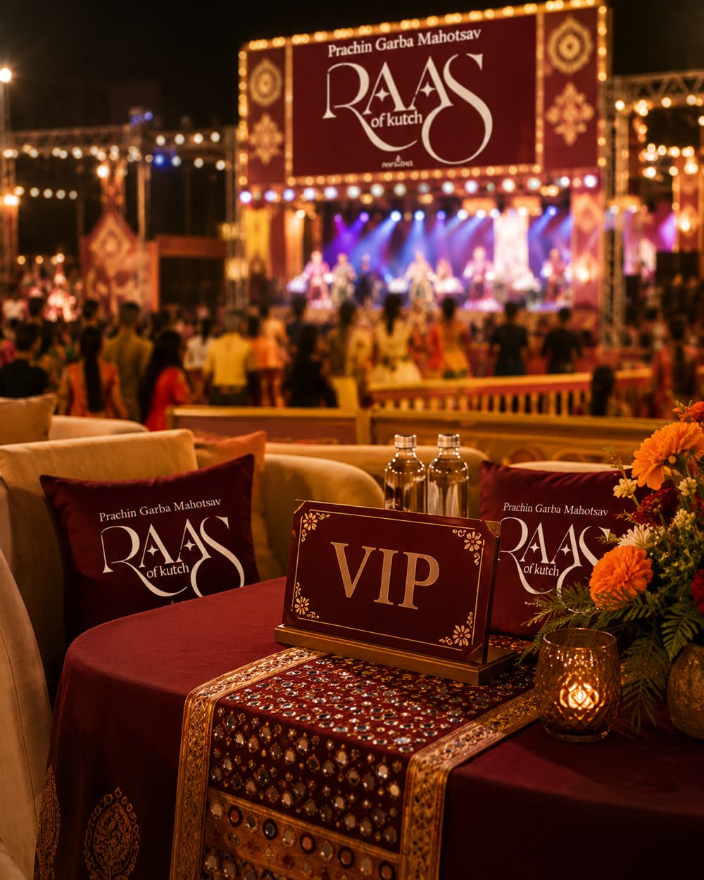 Branded VIP table with Raas of Kutch cushions facing the main stage